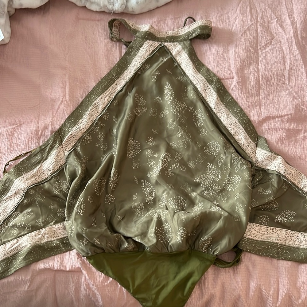 Free People Silky halter body suit that ties in the back
